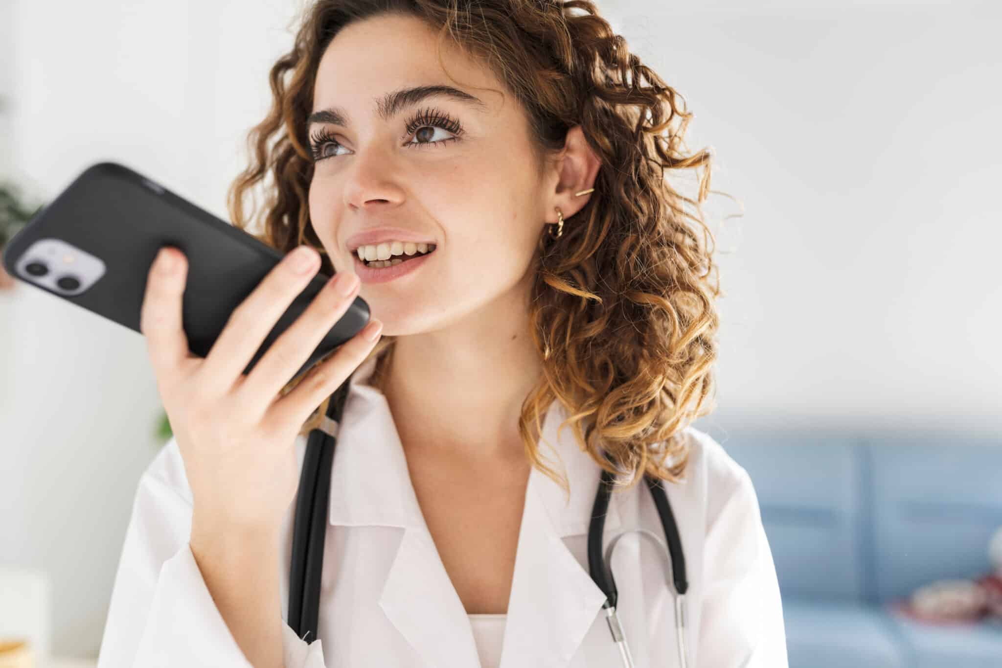 Doctor dictates report and uses speech recognition editing service to ensure error-free charts.
