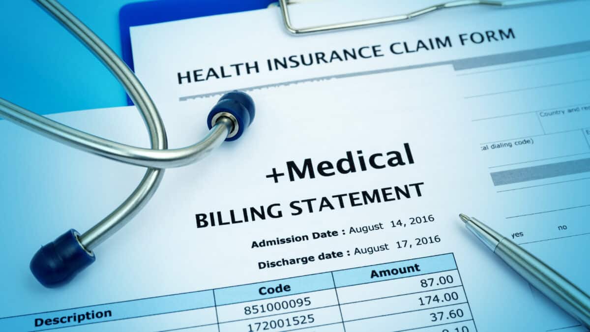 Medical bill and insurance claim form depict healthcare costs; medical transcription plays a role.
