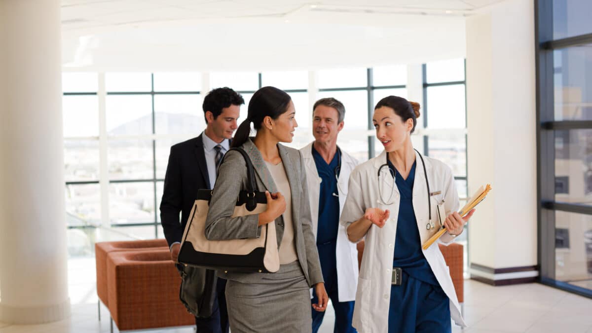 Executive staff and physicians discussing various clinical documentation options for their facility.