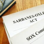 Sarbanes-Oxley Act and SOX policy symbolize importance of compliance in finance transcription.