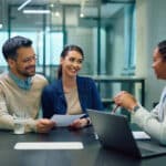 A couple discusses agreement with a bank manager, an instance where transcription services can help.