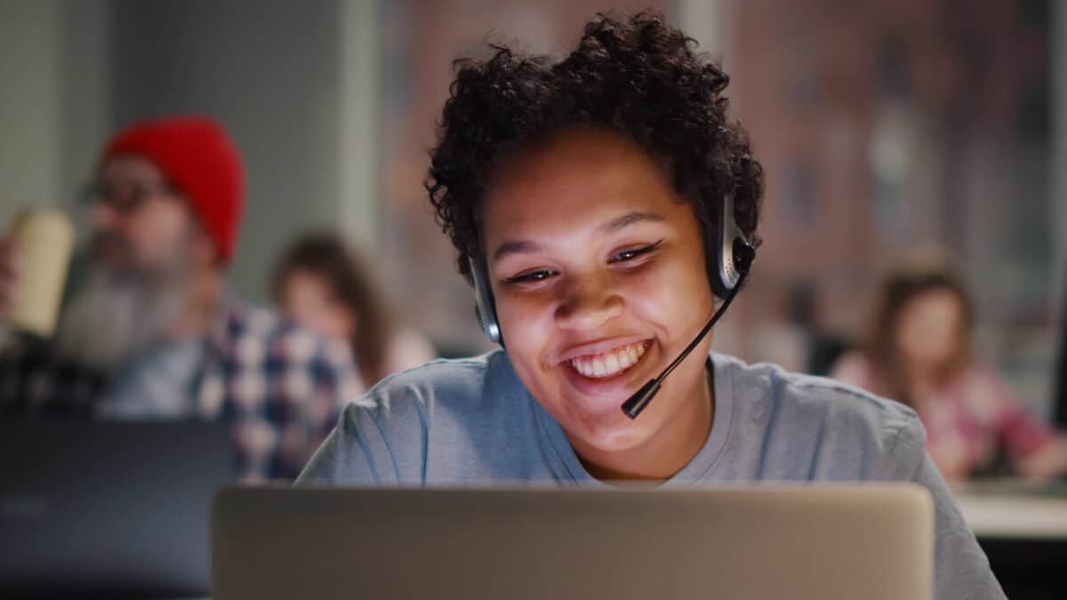 Insurance call center agent works on a support hotline. Her conversation will be transcribed.