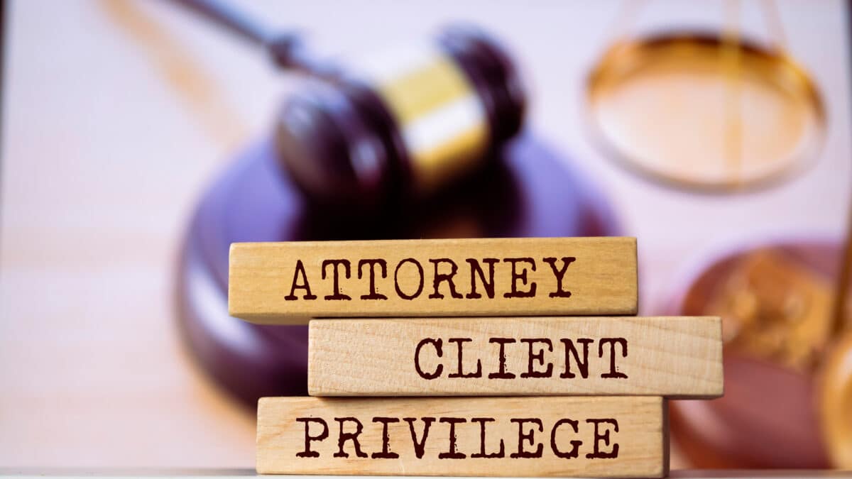 Blocks spell 'Attorney-Client Privilege', highlighting Athreon's secure transcription compliance.
