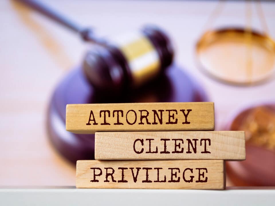 Blocks spell 'Attorney-Client Privilege', highlighting Athreon's secure transcription compliance.