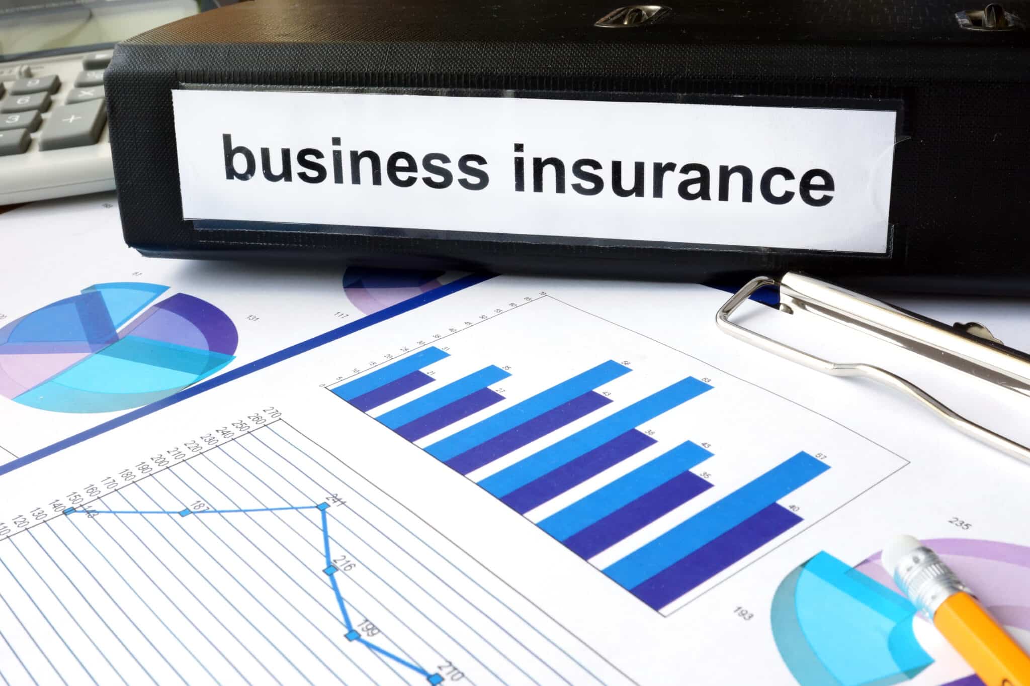 Folder labeled 'Business Insurance' beside charts; symbolizes insured transcription service coverage.