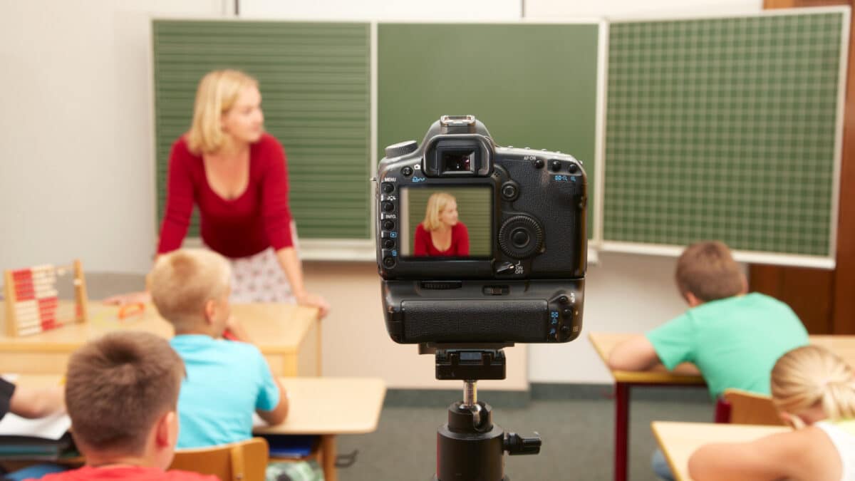 Teacher is recorded in classroom for transcription by Athreon's fast video transcription service.