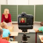 Teacher is recorded in classroom for transcription by Athreon's fast video transcription service.