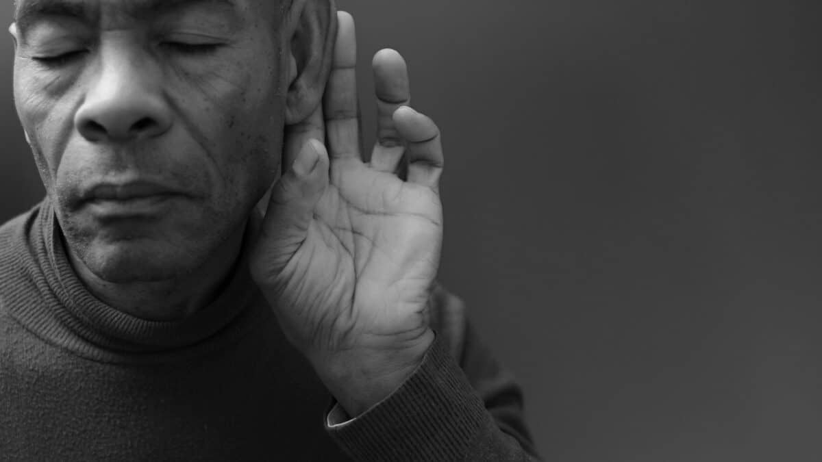 A man with deafness and hearing loss depicts the need for ADA-compliant captioning services.