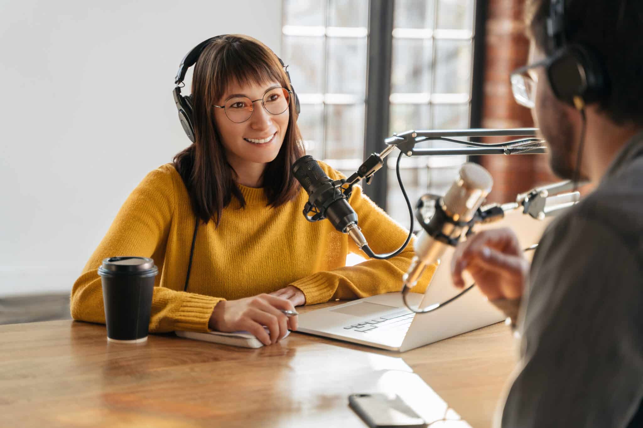 Podcasters host lively interview, using transcripts to boost their show's reach and accessibility.